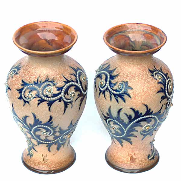George Tinworth - a pair of 10.5in (26cm) Royal Doulton vases