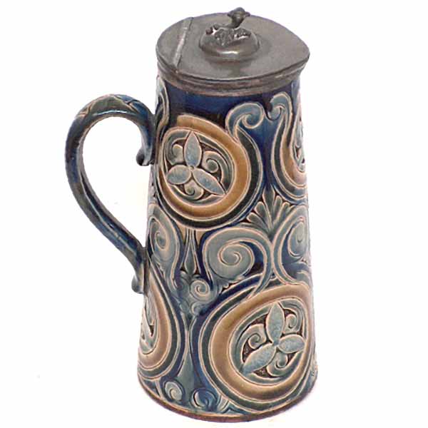 A Doulton Lambeth 9in lidded jug by Edith D Lupton