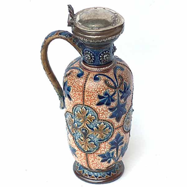 Elizabeth Fisher - a  9.5in (23.5cm) lidded Doulton Lambeth jug