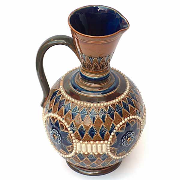 An 8.75in Doulton Lambeth ewer by Elizabeth Atkins