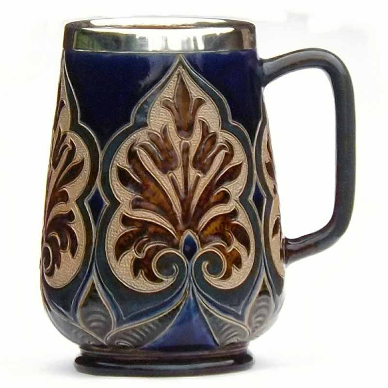 Alice Budden - a Doulton Lambeth 5.5in (13.5cm) silver rimmed mug - 200