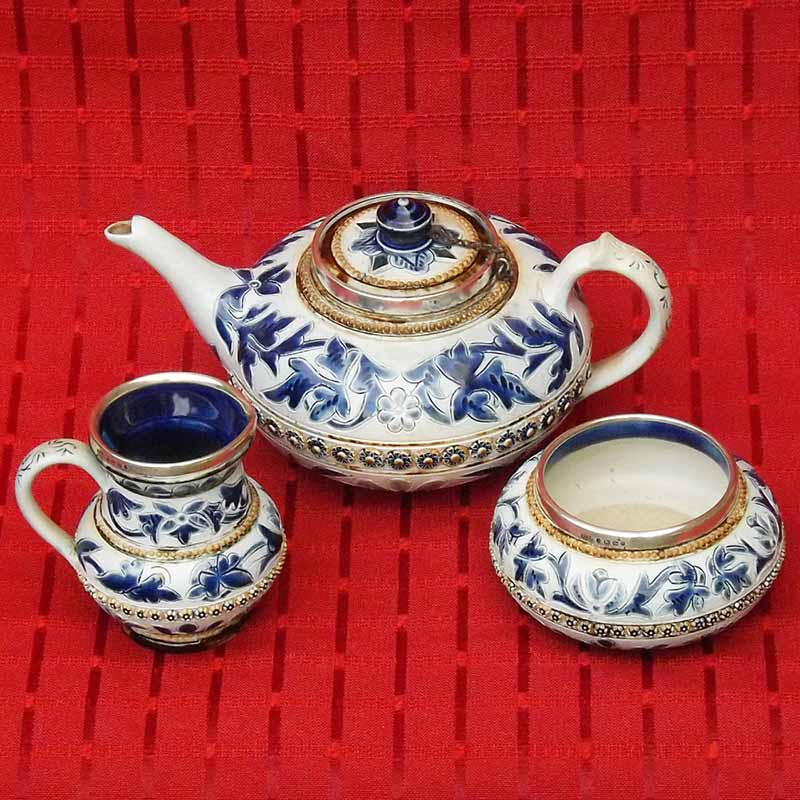 Edith Kemp- a Doulton Lambeth 3-piece tea set 