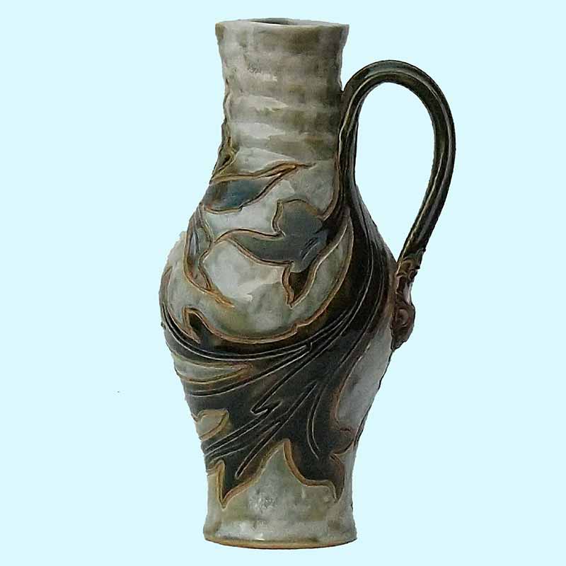 A 9in (22.5cm) Doulton Lambeth ewer designed by Mark Marshall -367