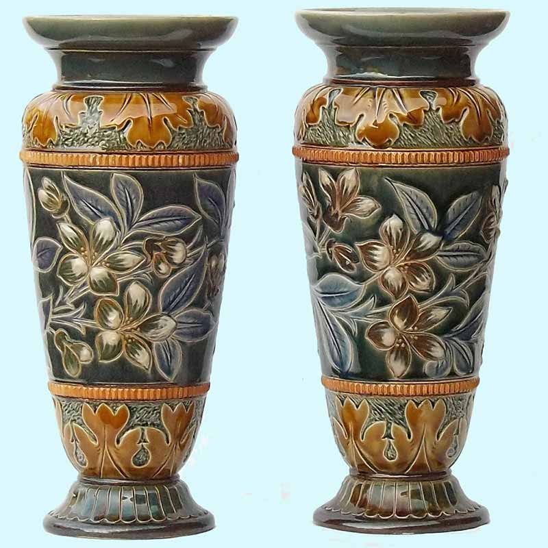 A pair of Doulton Lambeth 11.5in (29cm) vases designed by Elizabeth Small 