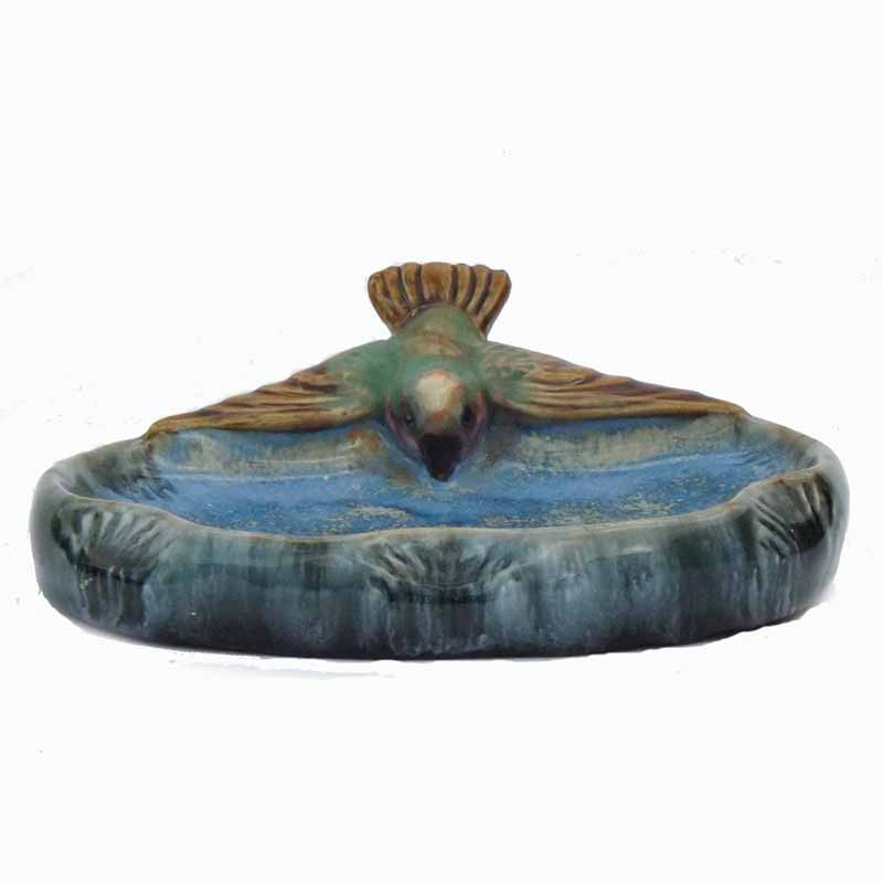 A 6in (15cm) bibelot with a bird motif.