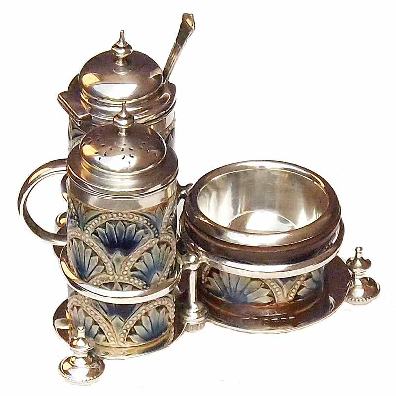 Francis E Lee - A three piece cruet with silver mounts