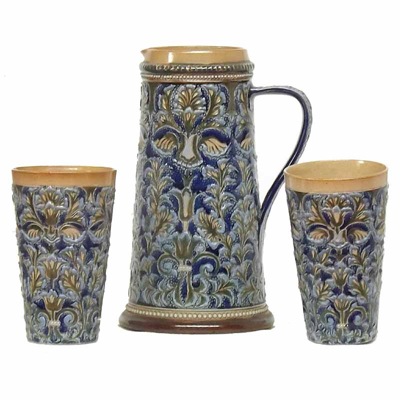 Elizabeth Sayers - A Doulton Lambeth 9.25in (23cm) lemonade jug with two matching beakers